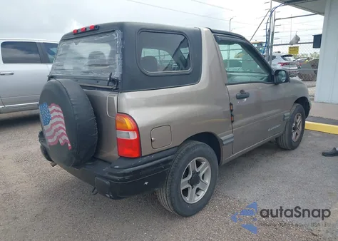 2003 Chevrolet Tracker from USA, damaged, VIN 2CNBE18C736933139